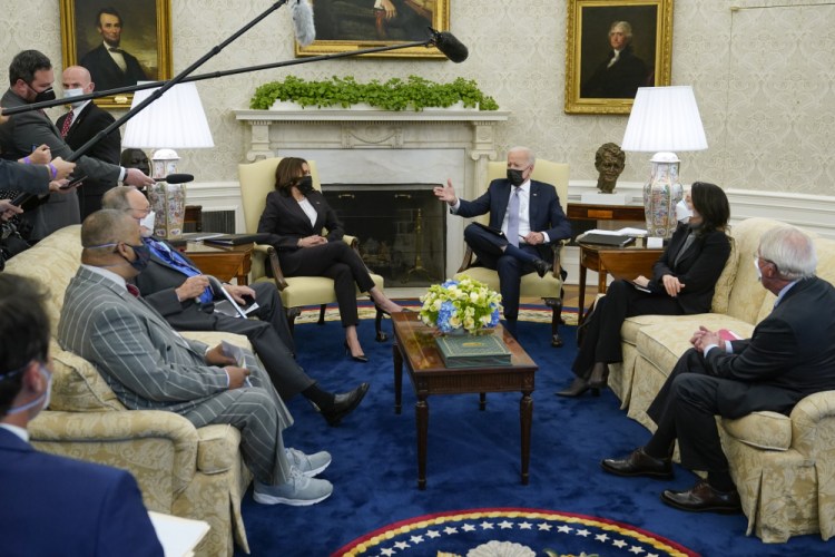 President Joe Biden and Vice President Kamala Harris meet with lawmakers to discuss the American Jobs Plan on Monday in the Oval Office. Most states received a letter grade on their infrastructure, though none got higher than a C.