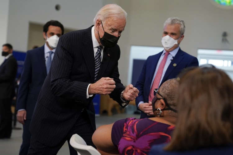 President Biden tours a vaccination site at Virginia Theological Seminary on Tuesday in Alexandria, Va. 