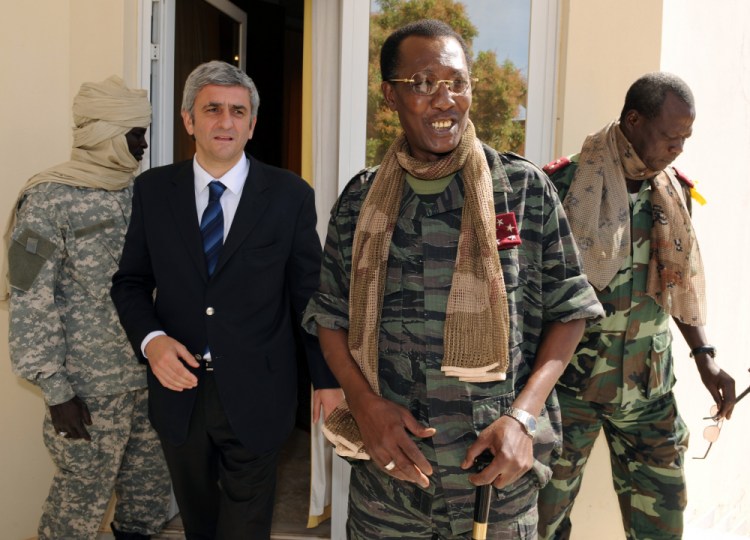 Chad's President Idriss Deby Itno, center-right, meets with French Defense Minister Herve Morin, center-left, in N'Djamena, Chad, in 2008. The country's top military commander announced Deby was killed on the battlefield Tuesday in a fight against rebels. 