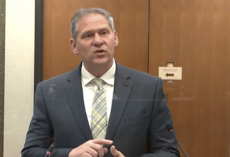 In this image from video, prosecutor Steve Schleicher speaks on April 14 in the trial of former Minneapolis police officer Derek Chauvin at the Hennepin County Courthouse in Minneapolis. 