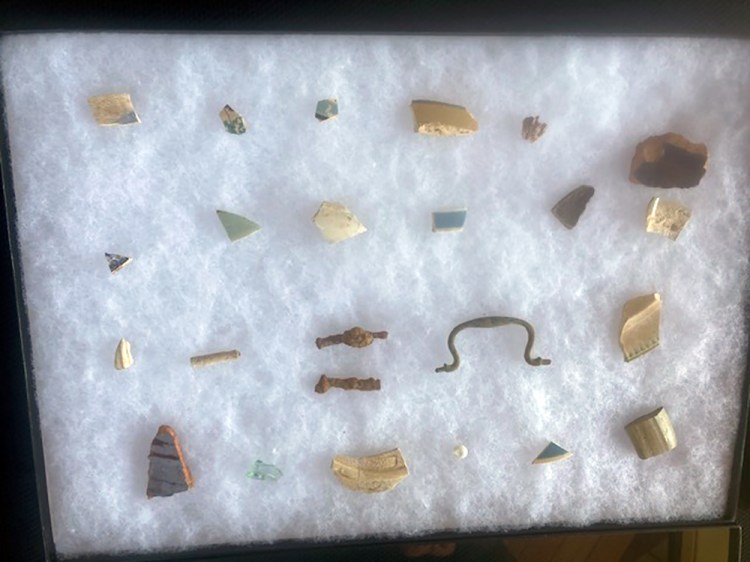 In this image provided by the U.S. Fish and Wildlife Service, items recovered from an archaeological site on Maryland's Eastern Shore that state officials believe to be the home of Harriet Tubman's father, Ben Ross, are displayed in a case, Tuesday, April 20, 2021, in Church Creek, Md. 