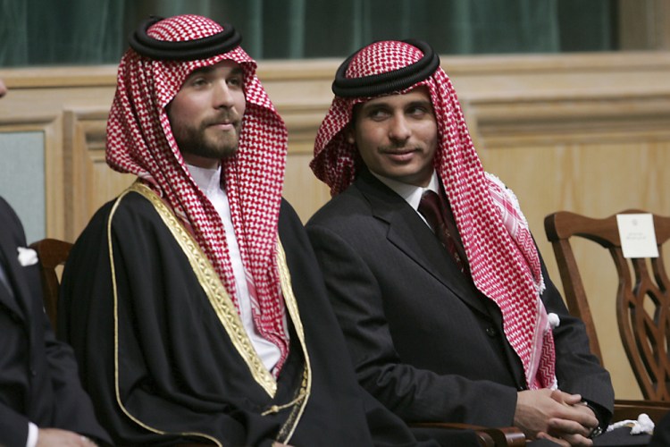 Prince Hamza bin Hussein, right, and Prince Hashem bin Hussein attend the opening of the parliament in Amman, Jordan, in 2006. In a video released Saturday, Hamzah, 41, accused Jordan’s ruling class of corruption and stifling freedom of expression.