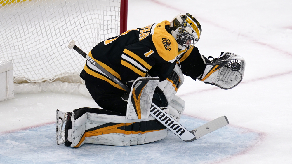 Bruins goalie Jeremy Swayman denied Hobey Baker, but honored