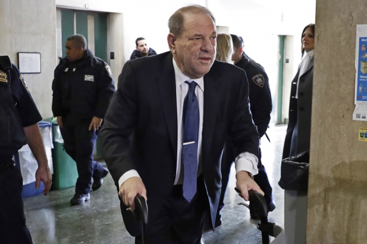 Harvey Weinstein arrives at a Manhattan court on Feb. 21, 2020, as jury deliberations continue in his rape trial. More than a year after Weinstein's conviction, his lawyers are demanding a new trial. 