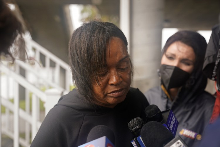 Dawn Saddler, sister of missing crewmember Gregory Walcott, talks to reporters as she leaves a briefing for family members by Coast Guard and NTSB officials in Port Fouchon, La., on Friday.  