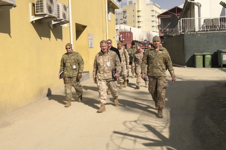 Marine Gen. Frank McKenzie, center, top U.S. commander for the Middle East, makes an unannounced visit in Kabul, Afghanistan on Jan. 31, 2020. 