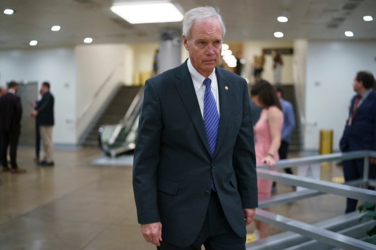 Sen. Ron Johnson, R-Wis., an ally of former President Donald Trump, arrives as senators go to the chamber for votes ahead of the approaching Memorial Day recess, at the Capitol in Washington, Thursday, May 27, 2021. Senate Republicans are ready to deploy the filibuster to block a commission on the Jan. 6 insurrection, shattering chances for a bipartisan probe of the deadly assault on the U.S. Capitol and reviving pressure to do away with the procedural tactic that critics say has lost its purpose. (AP Photo/J. Scott Applewhite)