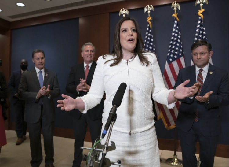 Rep. Elise Stefanik, R-N.Y., speaks to reporters at the Capitol in Washington on Friday just after she was elected chair of the House Republican Conference, replacing Rep. Liz Cheney, R-Wyo., who was ousted from the Republican leadership for criticizing former President Trump. She is joined by, from left, Rep. Gary Palmer, R-Ala., House Minority Leader Kevin McCarthy, R-Calif., and Rep. Mike Johnson, R-La. 