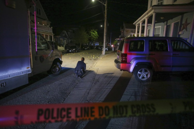 Providence police investigate a shooting,  late Thursday on Carolina Avenue in Providence, R.I. 