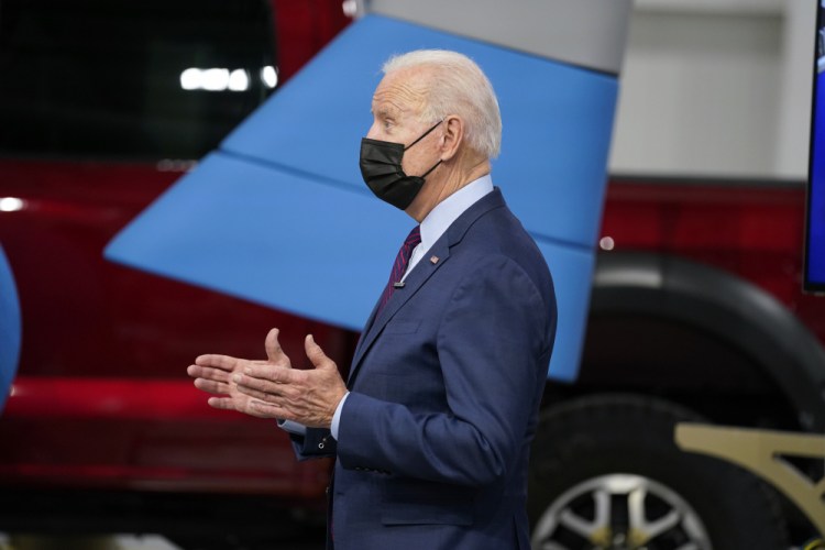 President Biden tours the Ford Rouge EV Center on Tuesday in Dearborn, Mich. The memo issued Tuesday says Biden's  $1.9 trillion relief package will lay “the groundwork for strong, durable growth for decades to come."