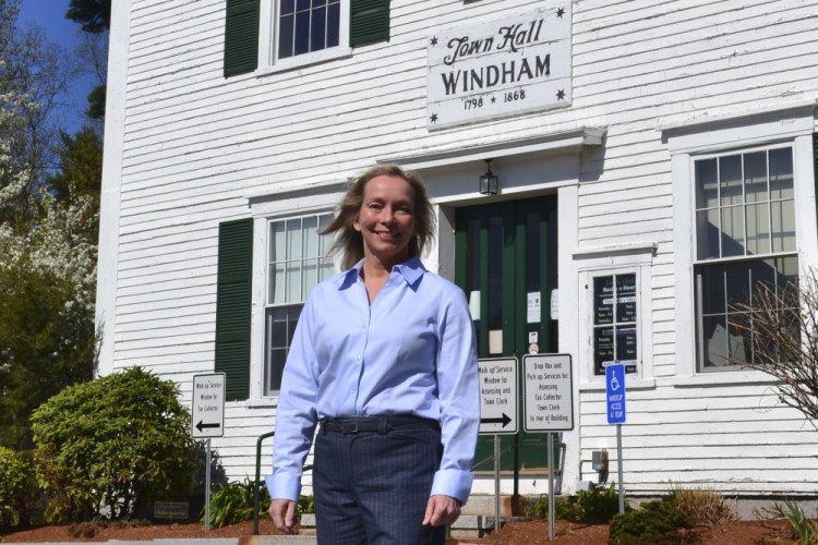 Kristi St. Laurent, who ran for a House seat in the 2020 election, poses in front of Town Hall May 7 in Windham, N.H. St. Laurent, who requested a recount after losing the 2020 election by 24 votes, has led to a debate over the integrity of the election in Windham and prompted Trump supporters to suggest the dispute could illustrate wider problems with the election system.