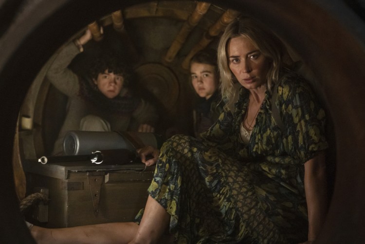  Noah Jupe, from left, Millicent Simmonds and Emily Blunt in a scene from "A Quiet Place Part II." 

