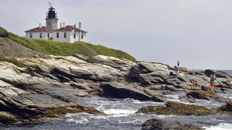 Fishermen cast on the rocky shore at the Beavertail Lighthouse, the third-oldest lighthouse in America, at the tip of Beavertail State Park, on Narragansett Bay, in Jamestown, R.I., in 2006. 