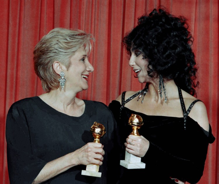 Olympia Dukakis. left,  and Cher hold the awards they received for performances in the hit movie "Moonstruck" at the Beverly Hilton Hotel in 1988.
