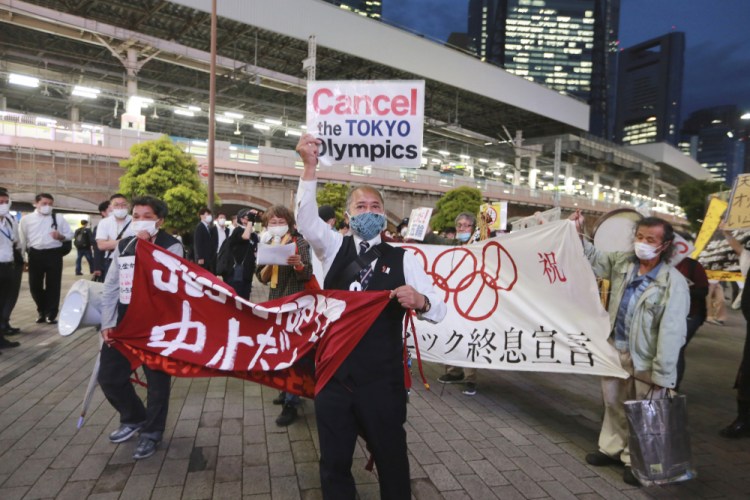 Demonstrators protest against the Tokyo 2020 Olympics in Tokyo on May 17, 2021. 