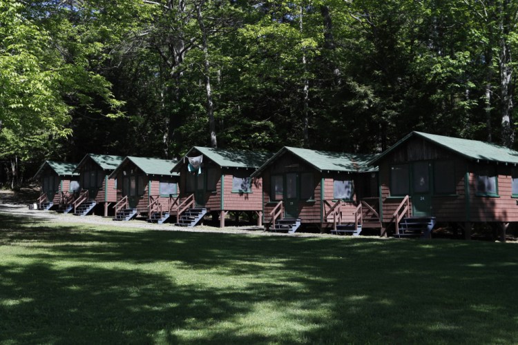 The U.S. Centers for Disease Control and Prevention on Friday posted guidance saying kids at summer camps, such as this one in Fayette, Maine, can skip wearing masks outdoors, with some exceptions. 