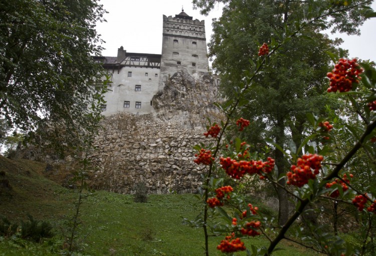 The Gothic Bran Castle, better known as Dracula Castle, is seen on a rainy day in Bran, in Romania's central Transylvania region, in October 2011. Romanian authorities have set up a COVID-19 vaccination center in a medieval building in Bran, not far from the castle, as a means to encourage people to vaccinate and also to boost tourism which has decreased in the area as a result of the pandemic. 