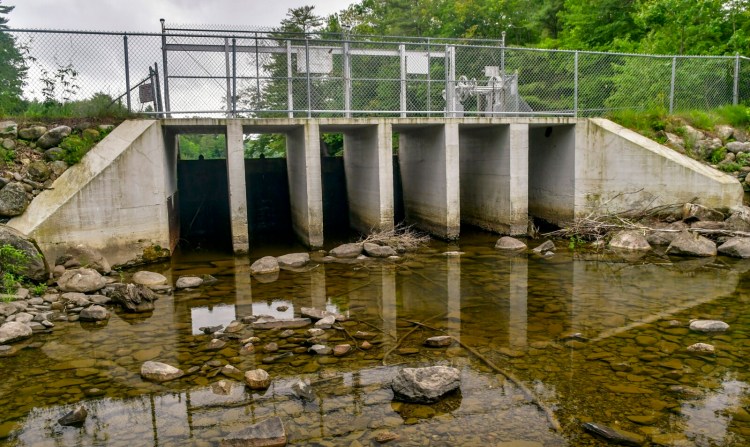 The dam at the east end of Woodbury Pond in Litchfield is shown on June 15, 2021. Town officials on Tuesday put the repair project out for bid and hope to choose a winning proposal next month.