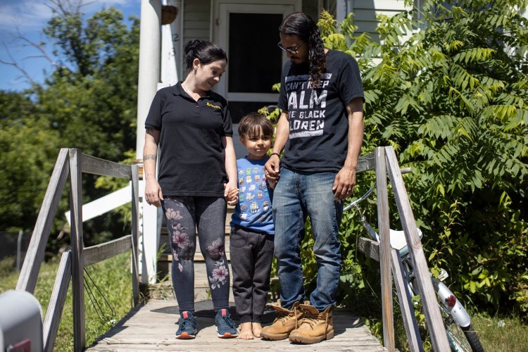 WATERVILLE, ME - JUNE 24: Michael Mosley, Desiree Mosley and their son Leander, 5, outside of their home in Waterville on Thursday, June 24, 2021. (Staff photo by Brianna Soukup/Staff Photographer)