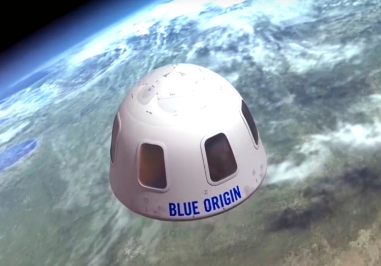 FILE - This undated illustration provided by Blue Origin shows the capsule that the company aims to take tourists into space. Jeff Bezos' rocket company is already calling its future clients "astronauts." One seat is up for grabs on the New Shepard rocket's debut passenger flight scheduled for July 2021; an online auction is underway. (Blue Origin via AP)
