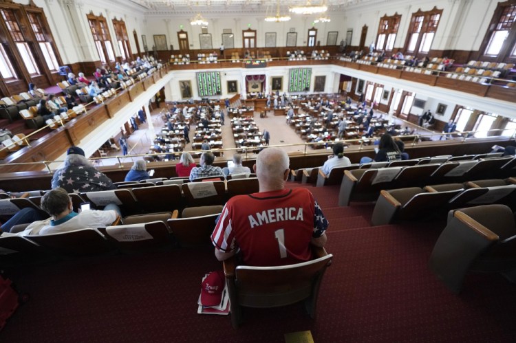 Gerald Welty sits in the House Chamber at the Texas Capitol as he waits to hear debate on voter legislation in Austin, Texas, in May. 