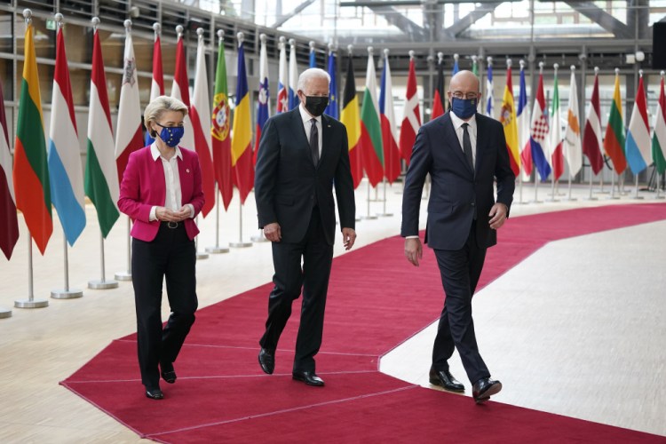 President Biden, center, walks with European Council President Charles Michel, right, and European Commission President Ursula von der Leyen during the United States-European Union Summit at the European Council in Brussels on Tuesday.