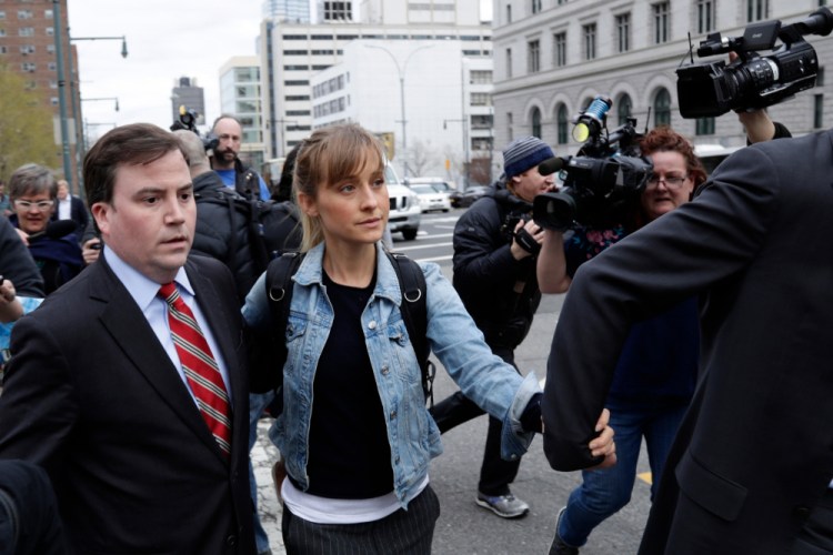 Allison Mack leaves Federal court in the Brooklyn borough of New York on April 24, 2018. 
