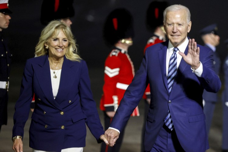 U.S. President Joe Biden and first lady Jill Biden arrive on Air Force One at Cornwall Airport Newquay, near Newquay, England, ahead of the G7 summit in Cornwall, early Thursday, June 10, 2021. 