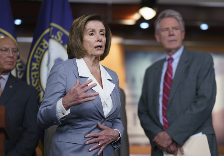 Speaker of the House Nancy Pelosi, D-Calif., responds to a question about her creation of a select committee to investigate the Jan. 6 insurrection at the Capitol, during a news conference at the Capitol in Washington on Wednesday. 