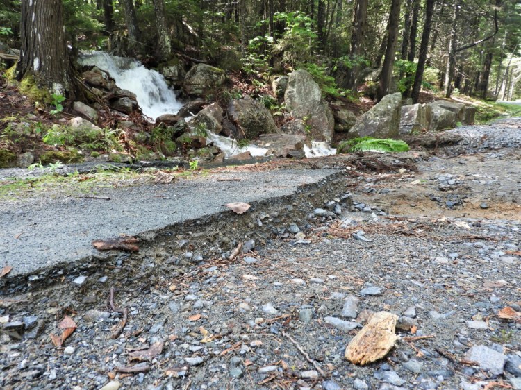Part of a carriage road in Acadia National Park is washed away after a severe storm last week. 