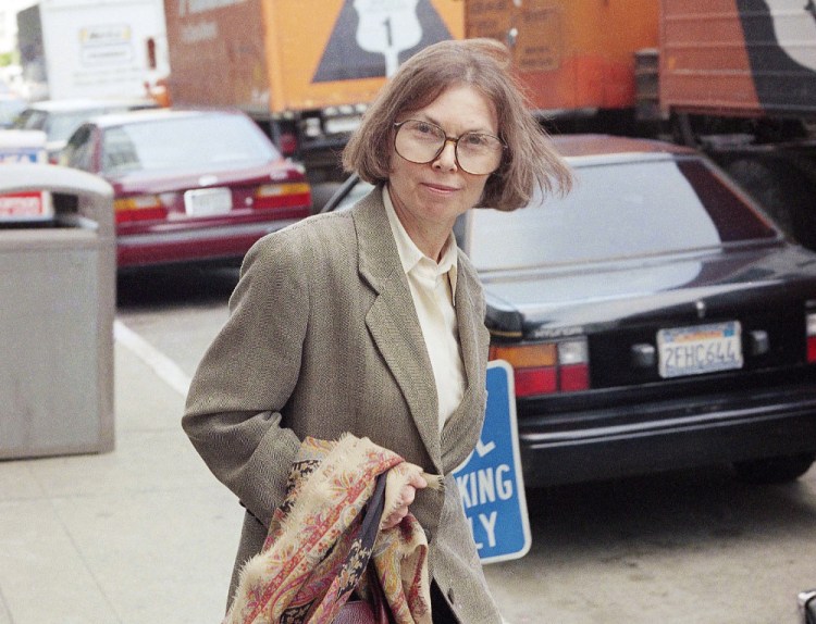 The New Yorker writer Janet Malcolm leaves the Federal Courthouse in San Francisco on June 3, 1993 in the suit trial brought by psychoanalyst Jeffrey Masson, who claims he was misquoted and libeled in a 1983 magazine article. Malcolm, the inquisitive and boldly subjective author and reporter known for her challenging critiques of everything from murder cases and art to journalism itself, has died. She was 86. 