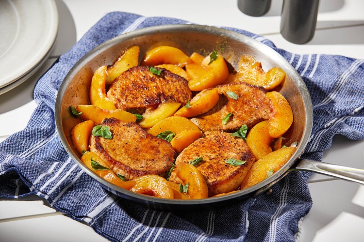 Pork Chops and Peaches Skillet. MUST CREDIT: Photo by Tom McCorkle for The Washington Post.