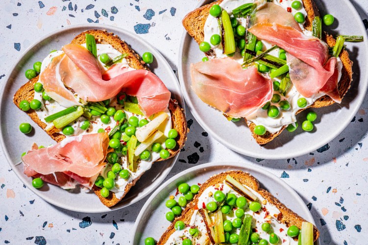 Whipped Ricotta Toasts With Green Garlic, Peas and Prosciutto. MUST CREDIT: Photo by Rey Lopez for The Washington Post.