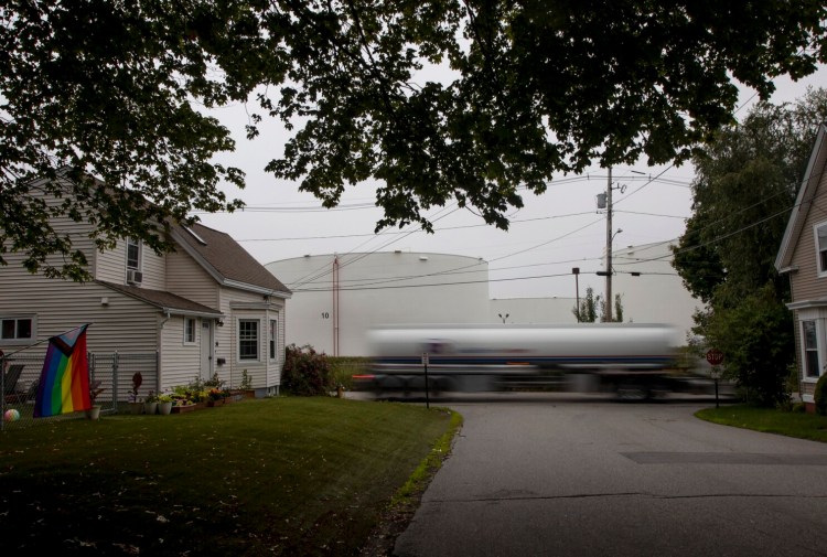 SOUTH PORTLAND, ME - JULY 14: A fuel tanker passes homes at the intersection of Elm and Palmer streets in South Portland. (Staff photo by Derek Davis/Staff Photographer)