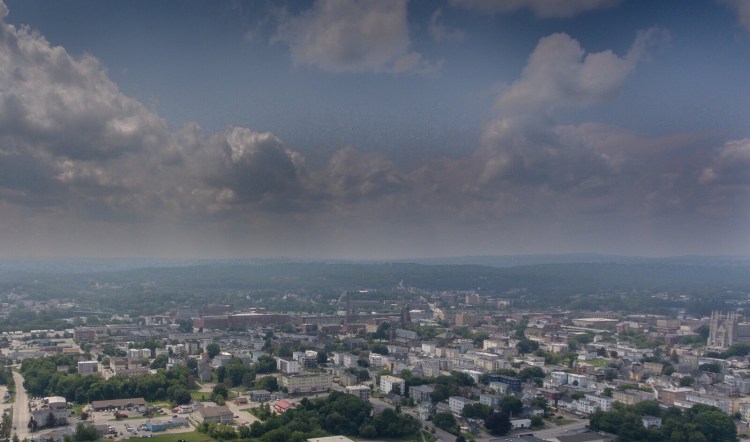 An aerial photo looking west over Lewiston and Auburn shows the haze in the air that has been attributed to western wildfires as seen in this aerial photo from July 21, 2021.