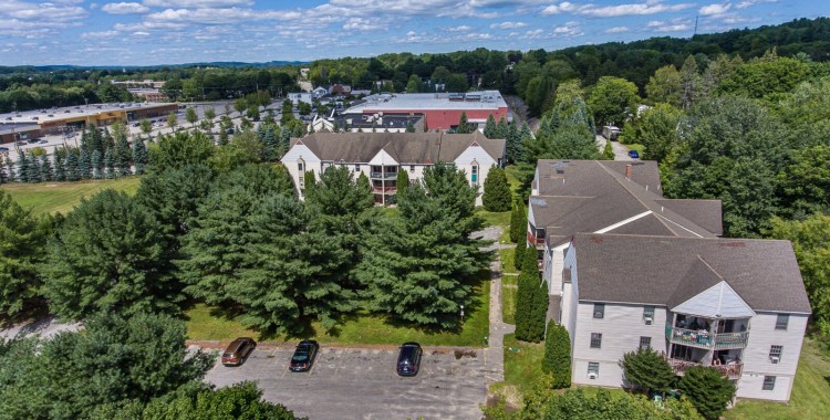 An aerial view of Mallview Terrace Apartments on Marston Street in Lewiston. Kevin Fletcher's Marston Investment Group LLC has purchased the 48-unit complex for $3.1 million with plans for major upgrades. The Lewiston Mall can be seen in the background left.