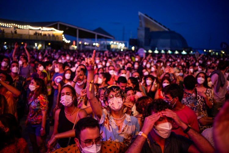 People attend the Cruilla music festival in Barcelona, Spain, Friday, July 9, 2021. (AP Photo/Joan Mateu)