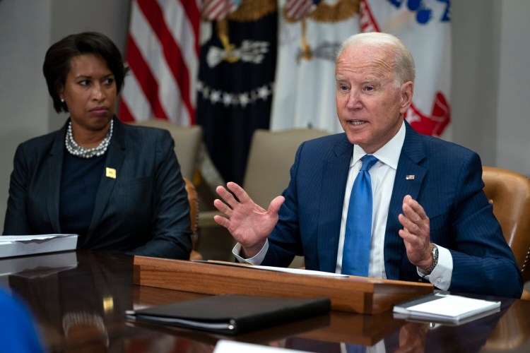 Washington Mayor Muriel Bowser listens as President Joe Biden speaks during a meeting on reducing gun violence, in the Roosevelt Room of the White House, Monday, July 12, 2021, in Washington. (AP Photo/Evan Vucci)