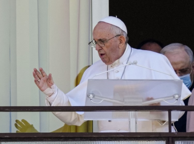 Pope Francis appears on a balcony of the Agostino Gemelli Polyclinic in Rome on Sunday for the traditional Sunday blessing and Angelus prayer. 