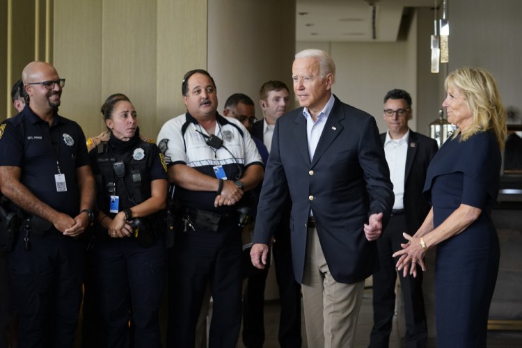 President Biden and first lady Jill Biden arrive to meet with first responders in Miami Beach, Fla., on Thursday. The crews were working on the condo tower that collapsed in Surfside, Fla., last week. 