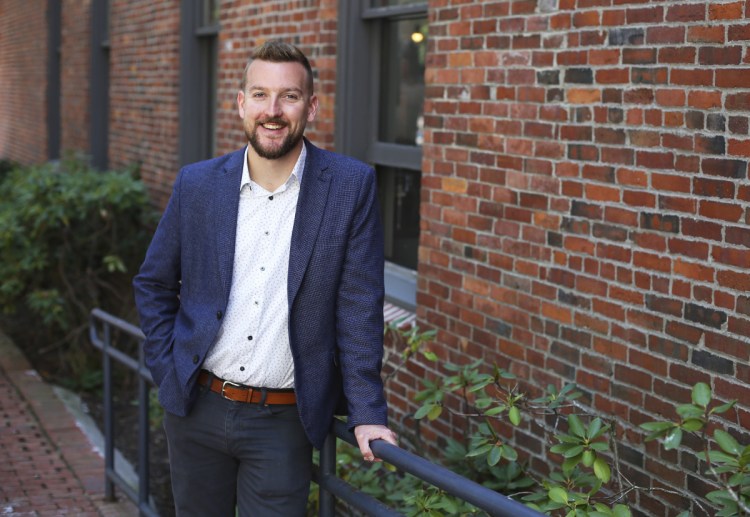 Brian Harris, co-founder and CEO of Portland-based MedRhythms, poses in front of the company's headquarters in this Press Herald file photo from 2018. The company has secured $25 million in venture capital funding to expand its operations.