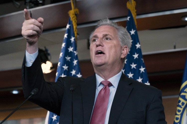 House Minority Leader Kevin McCarthy, R-Calif., shown in July, has threatened communication companies, saying they may be "subject to losing their ability to operate in the United States," if they comply with a request from the congressional committee investigating the Jan. 6 Capitol riot. He spoke to then-President Trump during the attack and is a potential witness in the case.