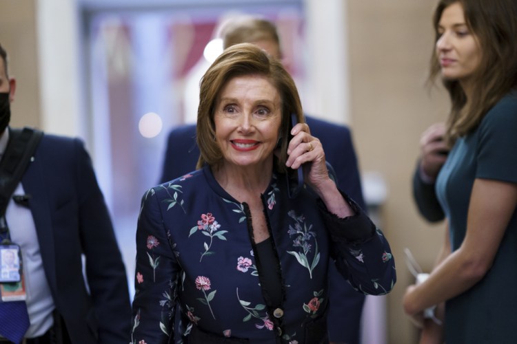Speaker of the House Nancy Pelosi, D-Calif., returns to her office where members of the House select committee on the Jan. 6 attack on the Capitol are preparing for the start of hearings next week, at the Capitol in Washington on Thursday.