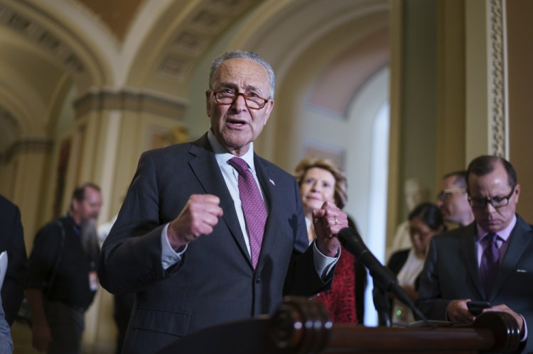 Senate Majority Leader Chuck Schumer, D-N.Y., shown Tuesday in Washington, told  Democratic colleagues to remain united as they draft a multitrillion-dollar package of once-in-a-generation investments for the nation that are the top priority for the president and his party. 