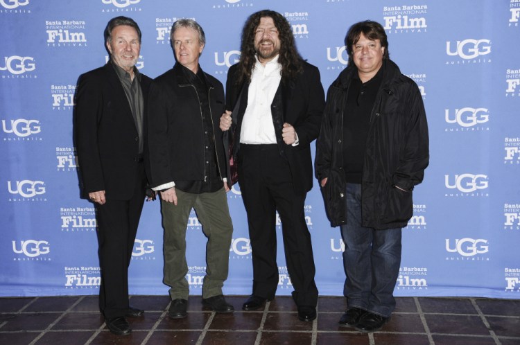 Manager Budd Carr, from left, drummer Phil Ehart and vocalist and violinist Robert E. “Robby” Steinhardt of Kansas, with director Charley Randazzo in  2015 in Santa Barbara, Calif. 

