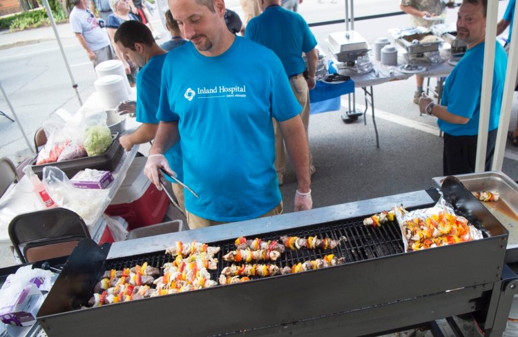 WATERVILLE, MAINE - AUGUST 8, 2018
Kenneth Bowman, with Inland Hospital, prepares kabobs during the annual Taste of Waterville on Main Street in downtown Waterville on Wednesday, Aug. 8, 2018. (Staff photo by Michael G. Seamans/Staff Photographer)