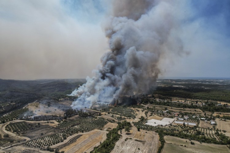 An aerial photo shows wildfires in Kacarlar village near the Mediterranean coastal town of Manavgat, Antalya, Turkey, on Saturday.