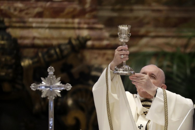 Pope Francis celebrates a Chrism Mass inside St. Peter's Basilica, at the Vatican on April 1, 2021. 