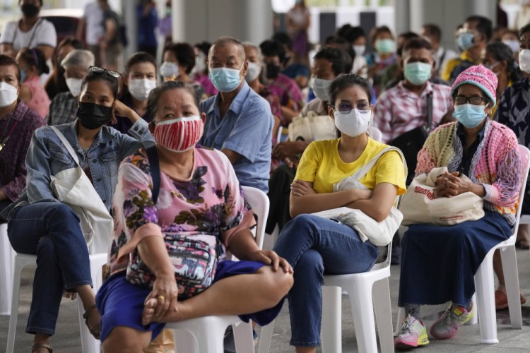 Residents wait to receives shots of the AstraZeneca COVID-19 vaccine at the Central Vaccination Center in Bangkok, Thailand on July 15.