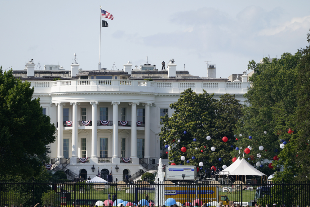 Virus Outbreak Biden July 4
